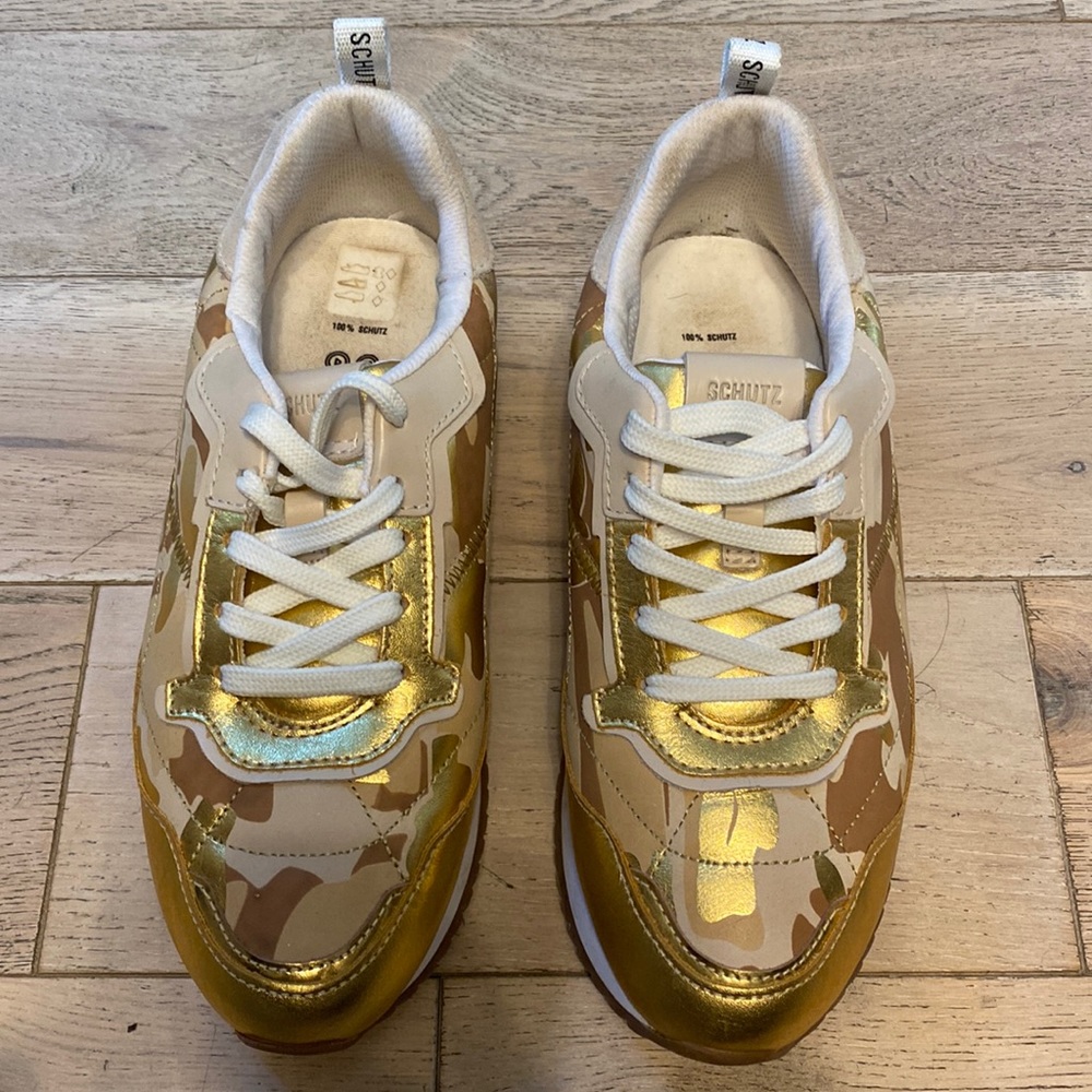 Schutz Penny Metallic Sneakers/Trainers in Gold
